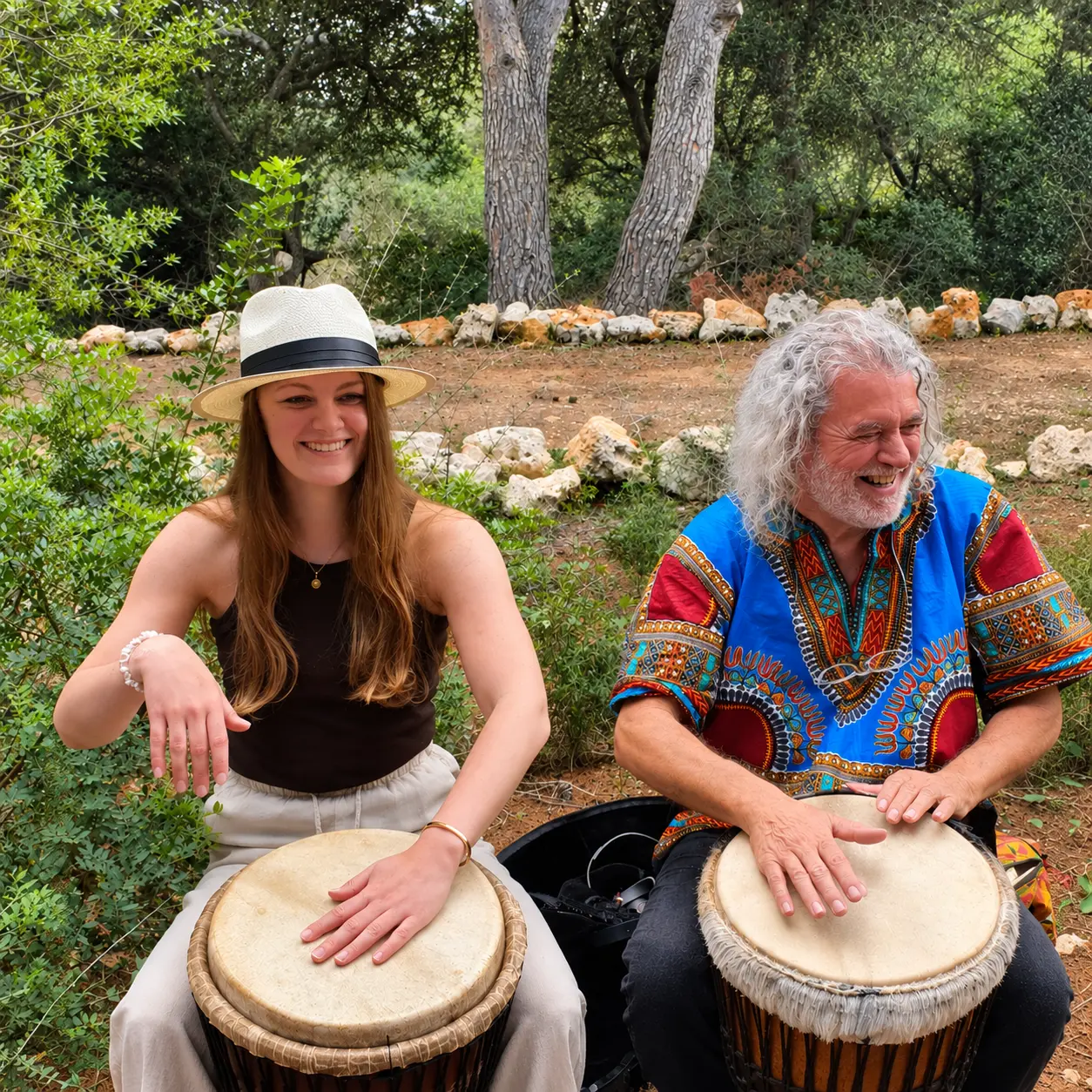 Drumming together outdoors among the trees